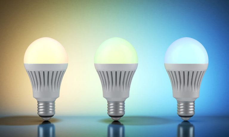 Three smart light bulbs with gradient background